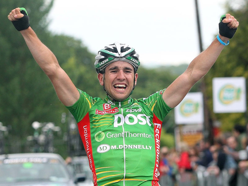 Mark Cassidy celebrates as he crosses the line to win the stage into Kilcullen.