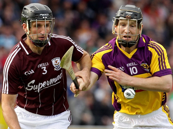 Shane Kavanagh of Galway challenges Michael Jacob of Wexford