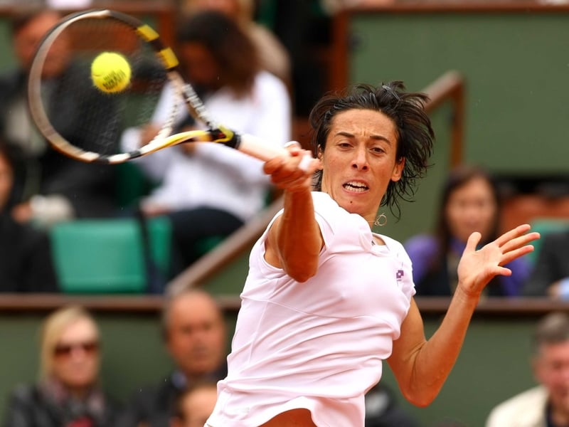 Francesca Schiavone has won her first major title, beating Samantha Stosur