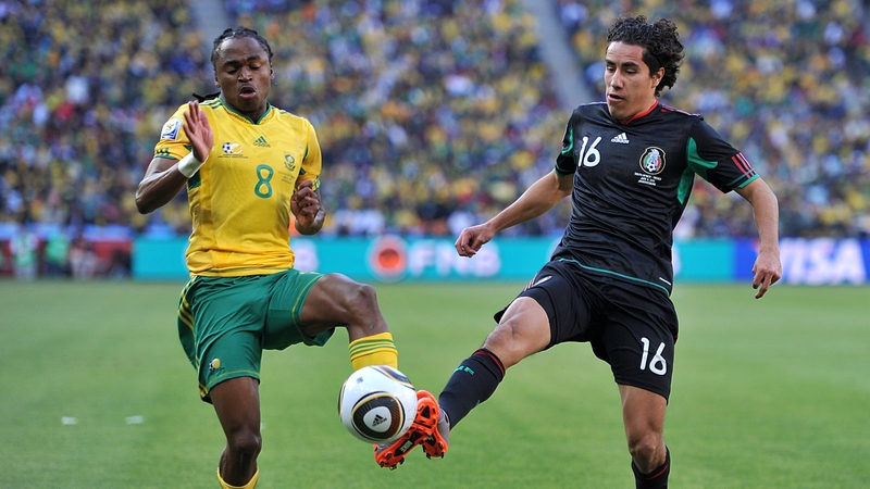 Mexico's Efrain Juarez (right) South Africa Siphiwe Tshabalala in action in the opening game of the World Cup
