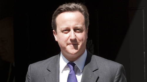 David Cameron - UK cuts growth forecast for next year