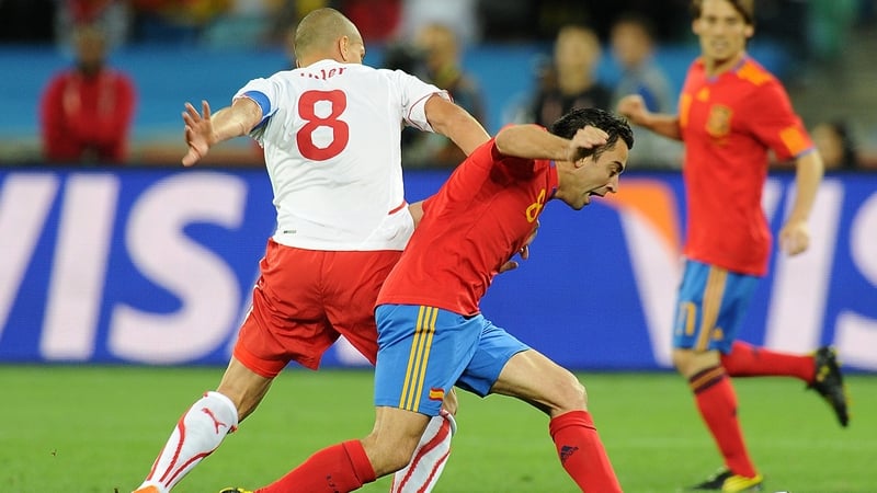 Spain v Switzerland - Switzerland's Gokhan Inler (left) and Spain's Xavi Hernandez battle for the ball in Durban