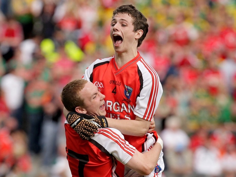 James Morgan lifts Kevin Nugent aloft at the final whistle of the All Ireland Minor Championship final