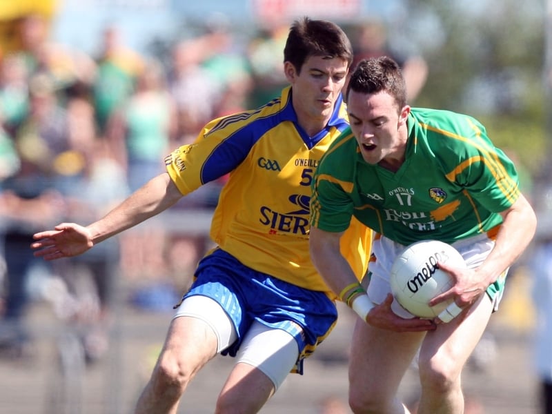 Roscommon's Sean Purcell hassles Gary Reynolds of Leitrim