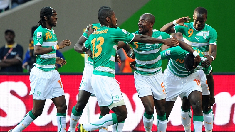 Ivory Coast's Gnegneri Toure Yaya (second right) celebrates with his teammates after scoring