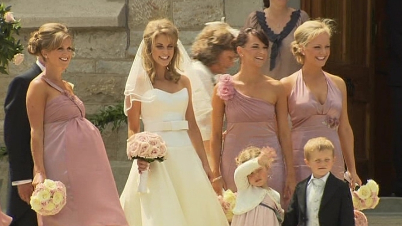 Amy arrives with her bridesmaids