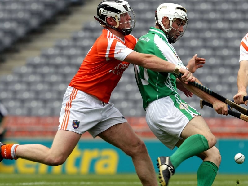 Nathan Curry (l) of Armagh tangles with London's Mark Mythen