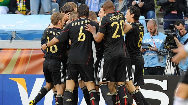Germany players celebrate after Thomas Muller scores their opening goal
