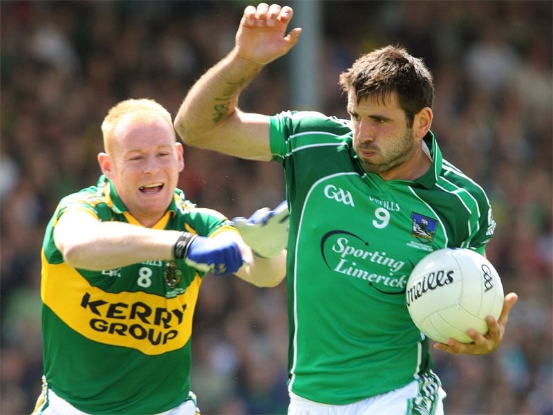 Seamus Scanlon of Kerry with John Galvin of Limerick