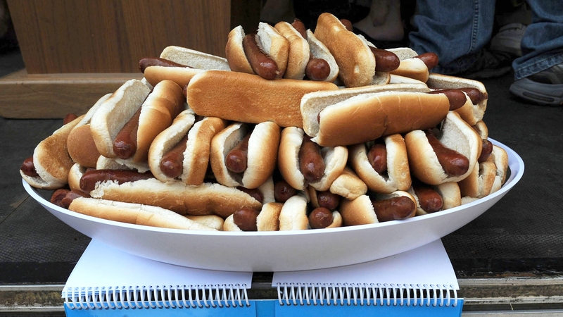 Hot Dogs - Former eating champ in contract dispute