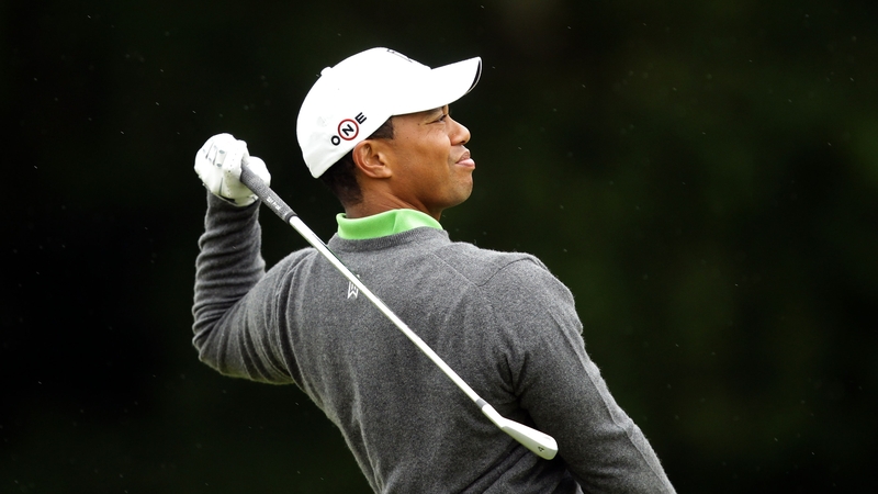 Tiger Woods shared the first round lead