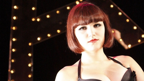 Barks on stage in Cabaret.