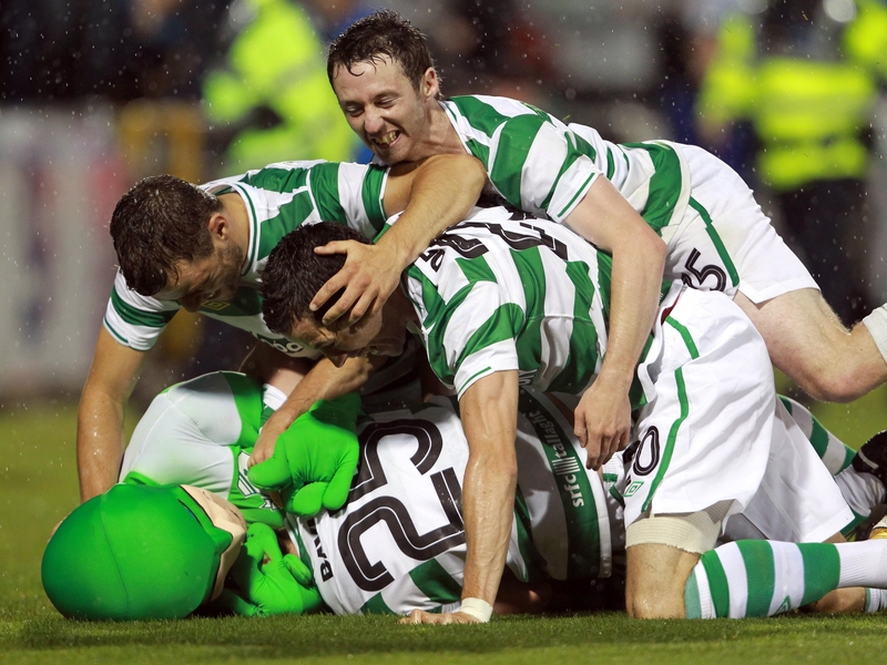 Robert Bayly is mobbed after grabbing the equaliser