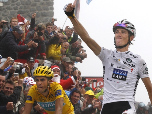 Andy Schleck won the prestigious stage finish at Col du Tourmalet, but title rival Alberto Contador was hot on his heels in second