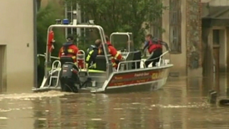 Floods - Rescue workers work to evacuate storm hit regions