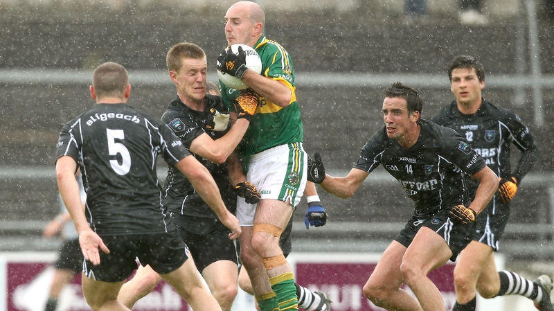Kerry's Michael Murphy has his avenue blocked by the Sligo contingent at Pearse Stadium