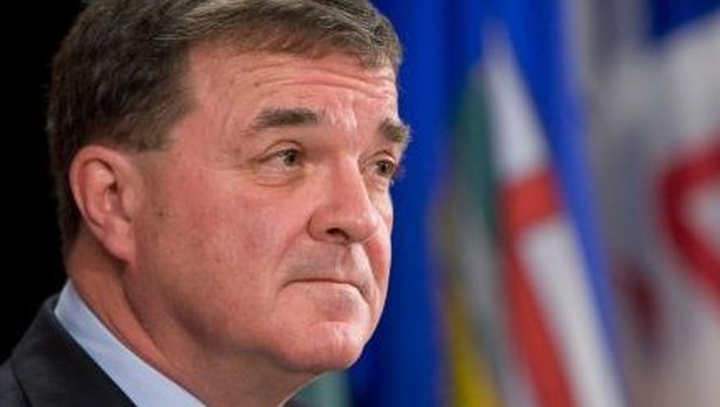 Canada's Finance Minister Jim Flaherty warns of larger write-downs on Greek debt