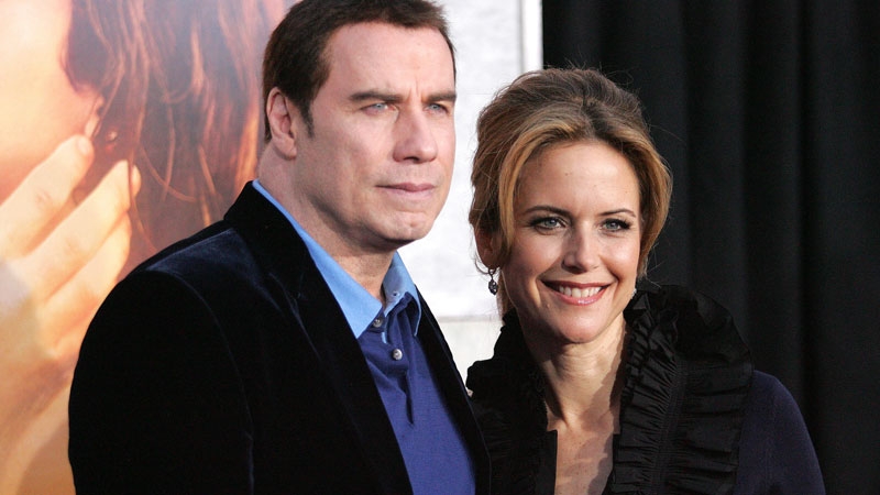 John Travolta pictured with his wife Kelly Preston