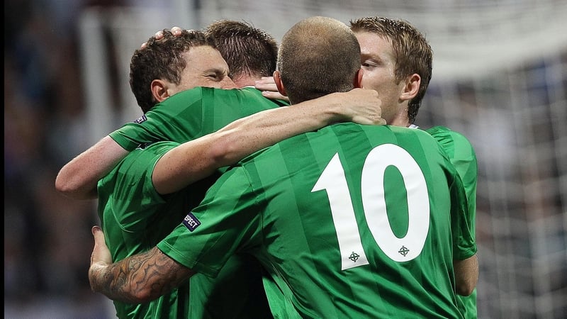 Northern Ireland's players celebrate Corry Evans' goal