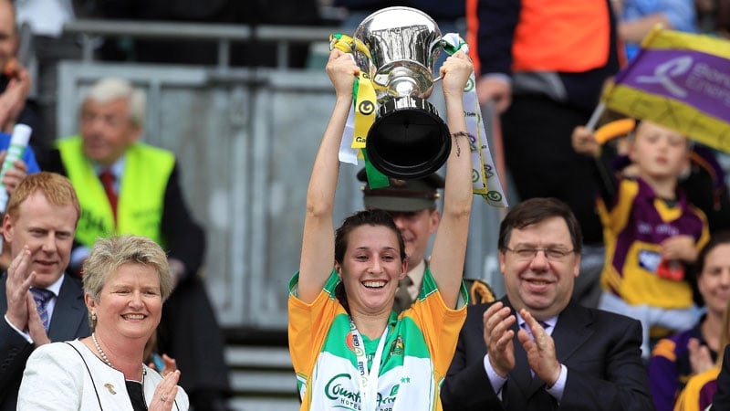 Offaly captain Michaela Morkan lifts the Jack McGrath cup following the win over Wexford
