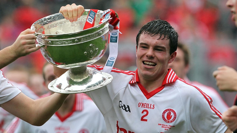 Tyrone captain Shea McGarrity with the Tommy Markham Cup.