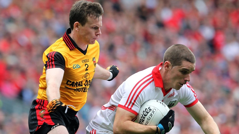 Daniel Goulding evades Down's Daniel McCartan