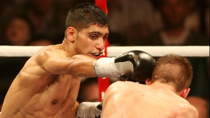 Amir Khan is hoping to set up a bout with Floyd Mayweather in 2012