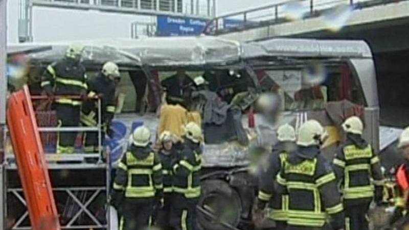 Germany - Rescue workers attend scene of fatal bus crash