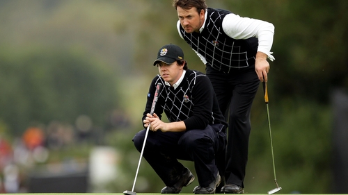 Graeme McDowell and Rory McIlroy eased to a 3&amp;1 victory in their foursome match against Zach Johnson and Hunter Mahan