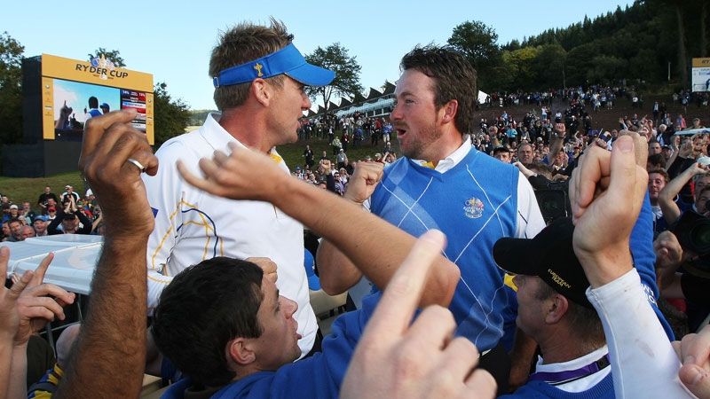 Graeme McDowell celebrates with Ian Poulter