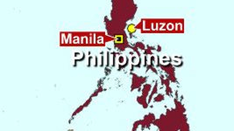 Philippines - District councillor's alleged killer appeared in family picture