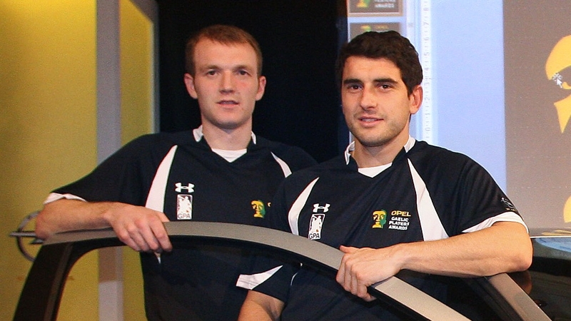 Lar Corbett (l) and Bernard Brogan pose alongside their new car