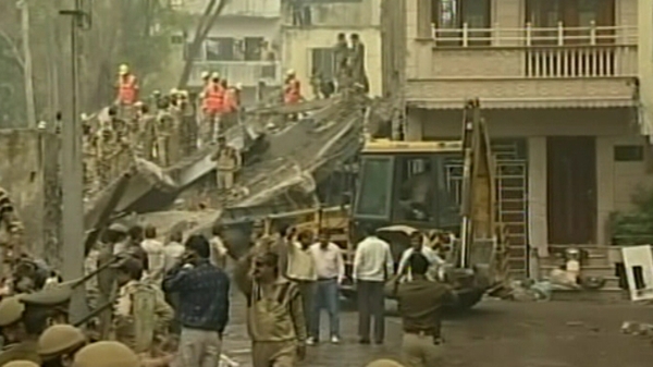 <p>64 dead in India after building collapses</p>