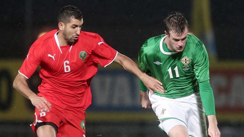 Morocco's Adil Hermach and Chris Brunt at Windsor Park