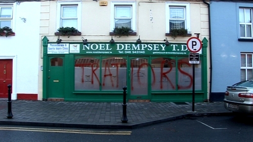 Trim - 'Tratiors' written on the front of the office