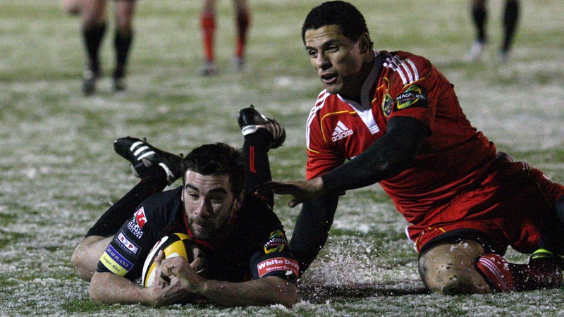 Tom Riley scores a try for the Dragons in difficult conditions in Rodney Parade