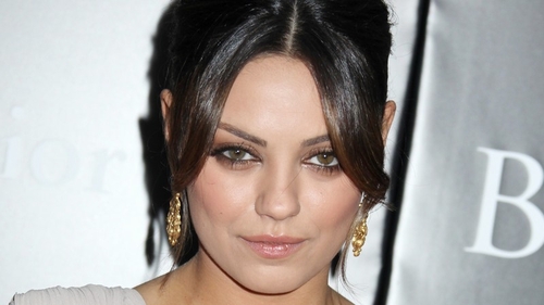 Kunis goes to the ball