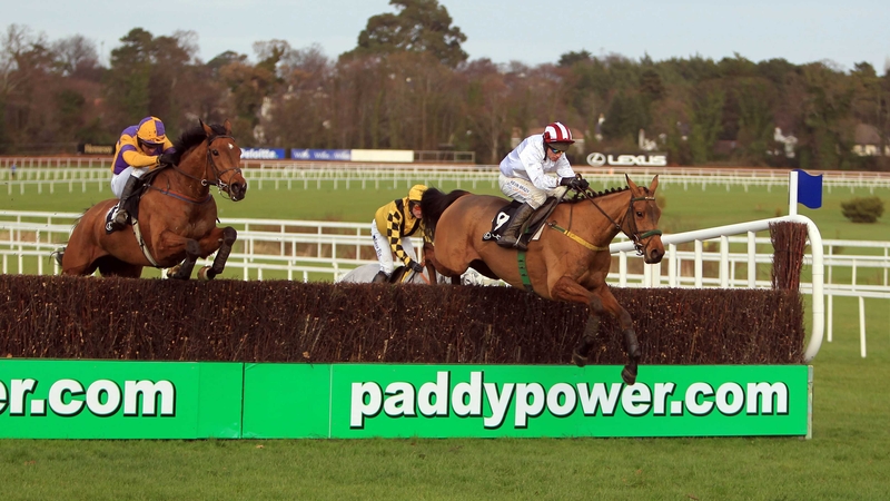 Pandorama and Paul Carberry clear the last to win the Lexus Chase