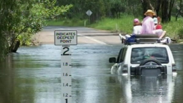 Kakadu National Park - Four climbed onto the roof of their vehicle awaiting rescue