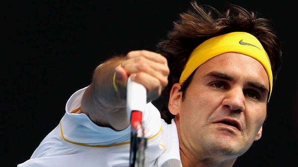 Roger Federer coasted into the second round in Australia
