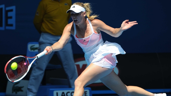Caroline Wozniacki is through to the last eight for the first time