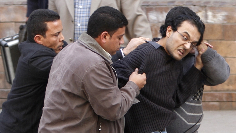 Cairo - Plain clothes officers arrested protestors