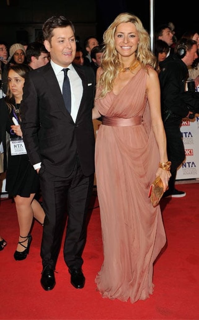 Brian Dowling picture with Tess Daly who look stunning