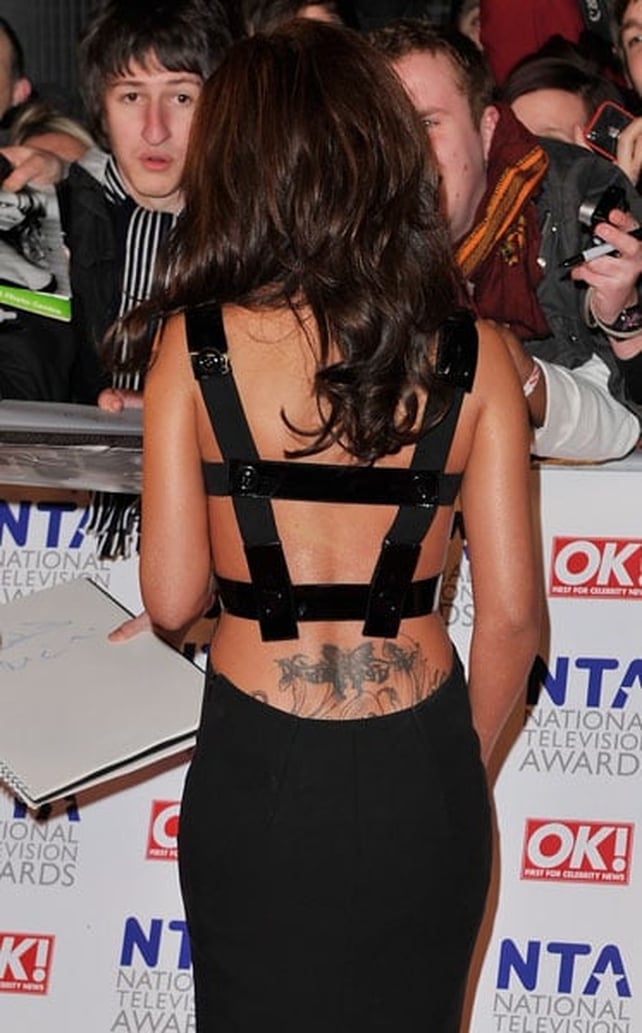 Cheryl was showing off her latest tattoo