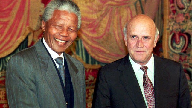 Nelson Mandela and South African President Frederik de Klerk shake hands in Oslo in December 1993, on the eve of jointly receiving the Nobel Peace prize