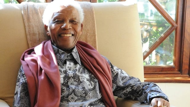 Nelson Mandela relaxes a few minutes before the start of his 92nd birthday celebrations at his home in Johannesburg on 18 July 2010