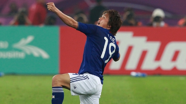 Goalscorer Tadanari Lee gets all Robbie Keane with his bow and arrow celebration as Japan won the Asian Cup at Khalifa Stadium in Qatar