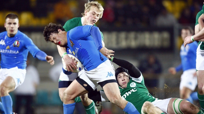 Ireland's Luke Marshall and Aaron Conneely tackle Luca Morisi of Italy