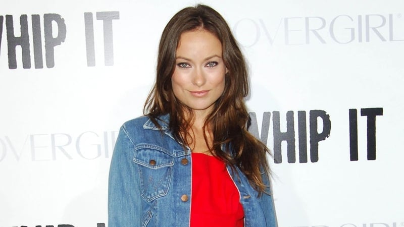 Wilde - Olivia says split was to avoid "living unhappily"