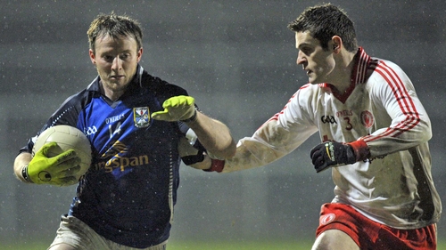 Cavan's Damien McCaul and Gerard Pierson of Tyrone in action at Brewster Park